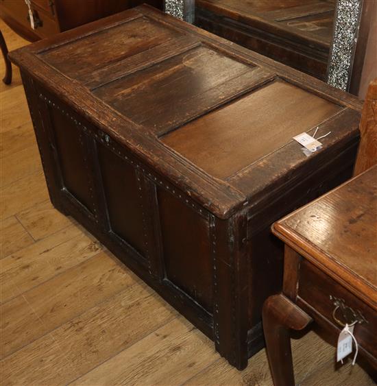 An early 18th century panelled oak coffer W.105cm